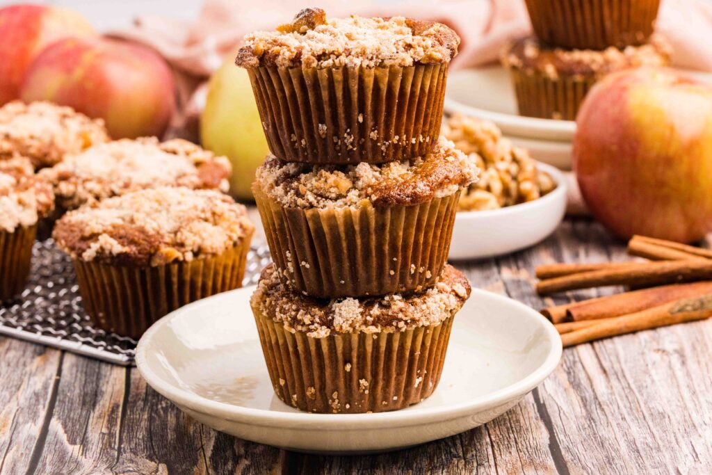 stack of muffins made with applesauce with a crumble topping